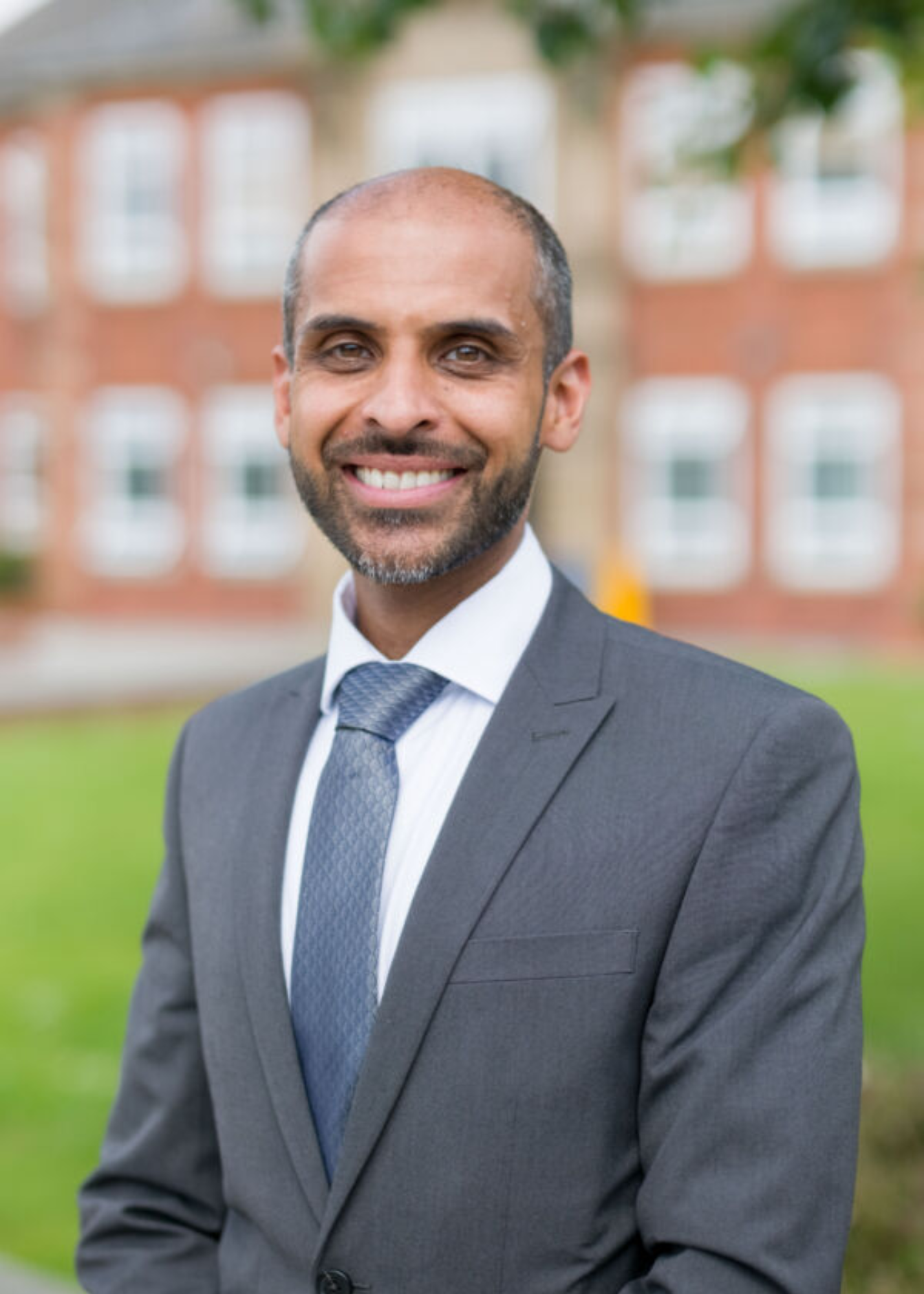 Photo of Imran Iqbal, headteacher at Holly Lodge High School and Smethwick Partnership Board member