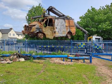 Burnout vehicle being lifted from a park
