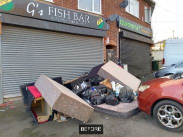 Fly-tipped waste outside of a closed food business