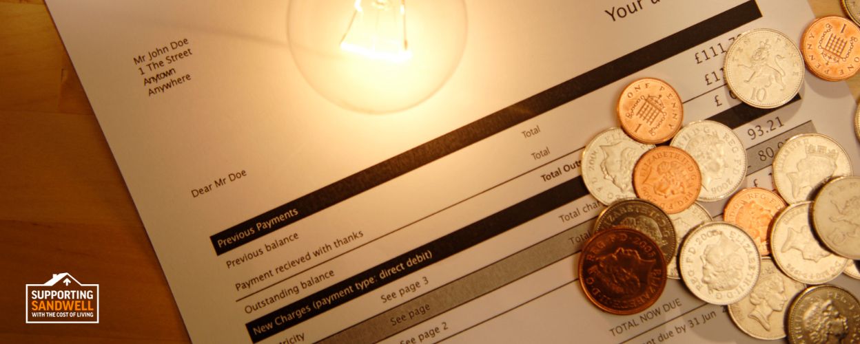 Image of a utility bill, lightbulb and money