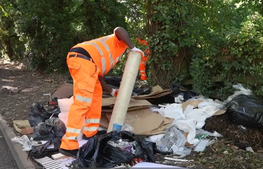 Removing fly-tipped rubbish on Forge Lane