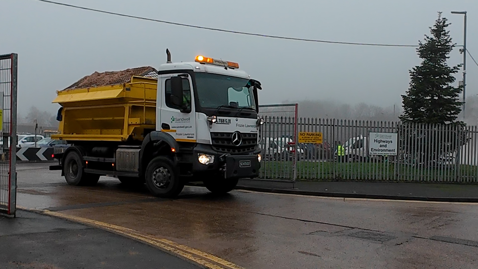 Image of gritting truck leaving depot