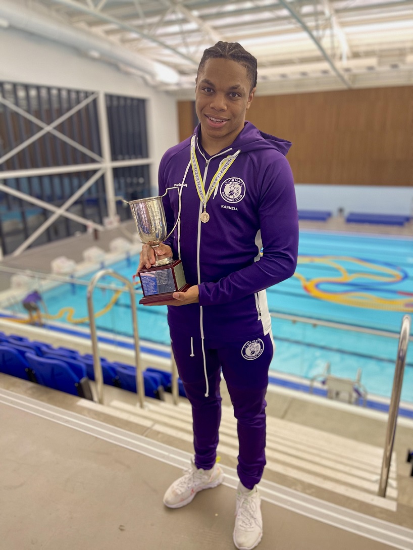 Karnell Nunes-Smith with his medal and trophy from the Warwickshire County Swimming Championships 2022.