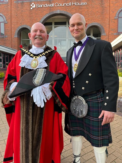 Mayor of sandwell councillor bill gavan with his consort adam kennedy