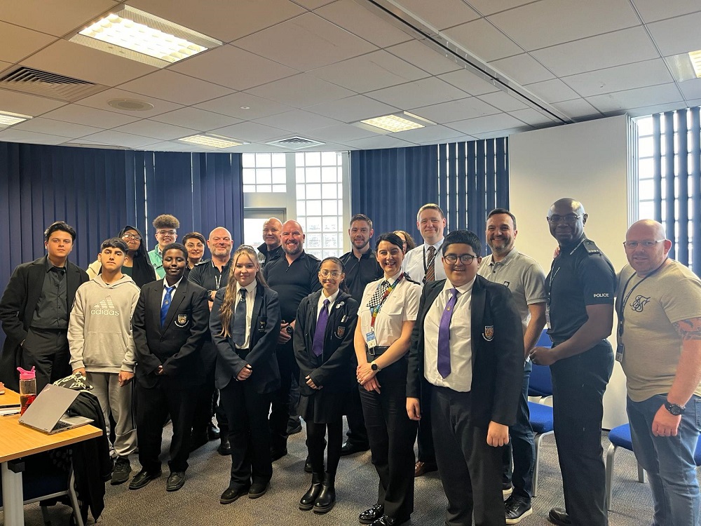 SHAPE Youth Forum members with West Midlands Police representatives at the Takeover event