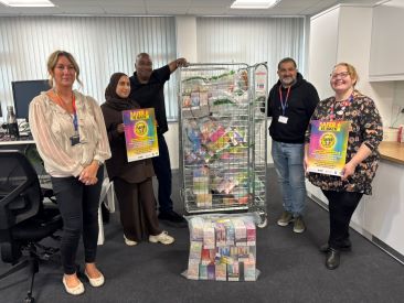 Safer 6 staff with siezed illegal tobacco and goods