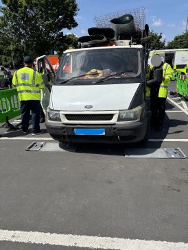 Front view of overloaded scrap vehicle